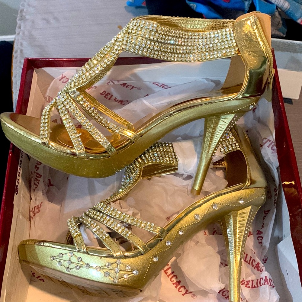 Gold high heels….brand new never worn. Perfect for date night.